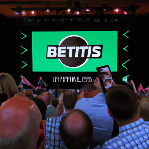 An image of a diverse group of people excitedly watching a sports event on a big screen, with a backdrop of the Betwinner logo