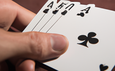 An image showcasing a close-up view of a blackjack table, with a player's hand holding two cards strategically positioned for a hit or stand decision